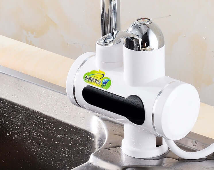 Electric hot water faucet installed on a kitchen sink, modern white and chrome design