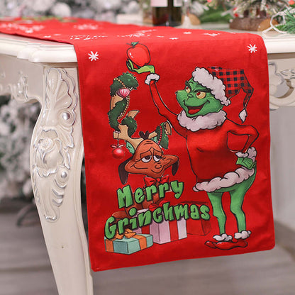 Red Christmas table runner featuring cartoon characters, festive gifts, and holiday decor