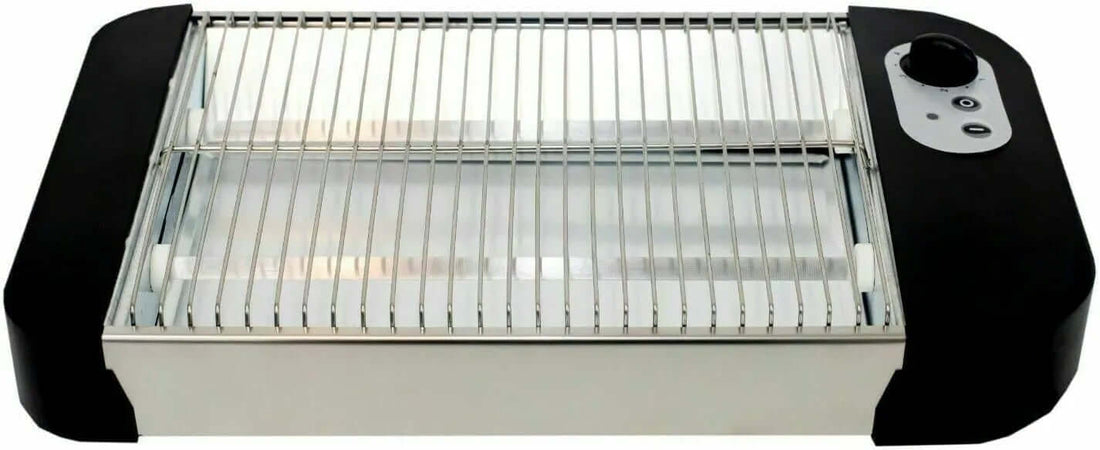 Electric kitchen grill with metal grate and temperature control knob