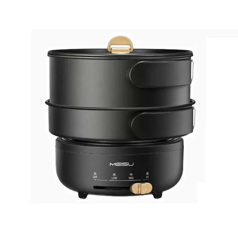 Black electric food steamer with two tiers and gold accents, modern kitchen appliance