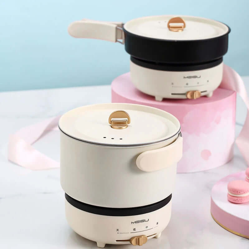 Elegant electric cooking pots with handles and lids, modern kitchen appliances on display.