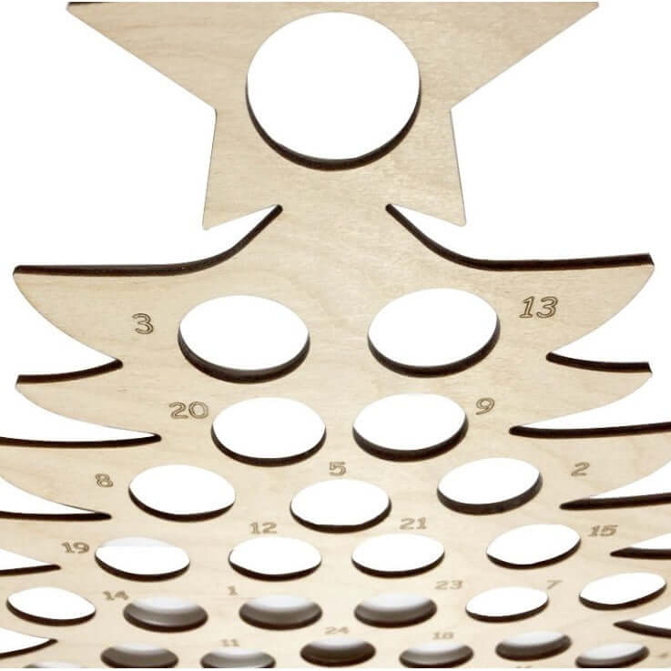 Wooden Christmas tree-shaped advent calendar with numbered circular slots