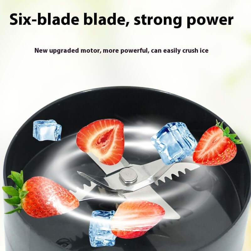 Six-blade blender grinding strawberries and ice cubes, highlighting powerful kitchen appliance.