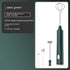 Dark green handheld electric whisk with detachable attachments and USB charging cable, kitchen gadget