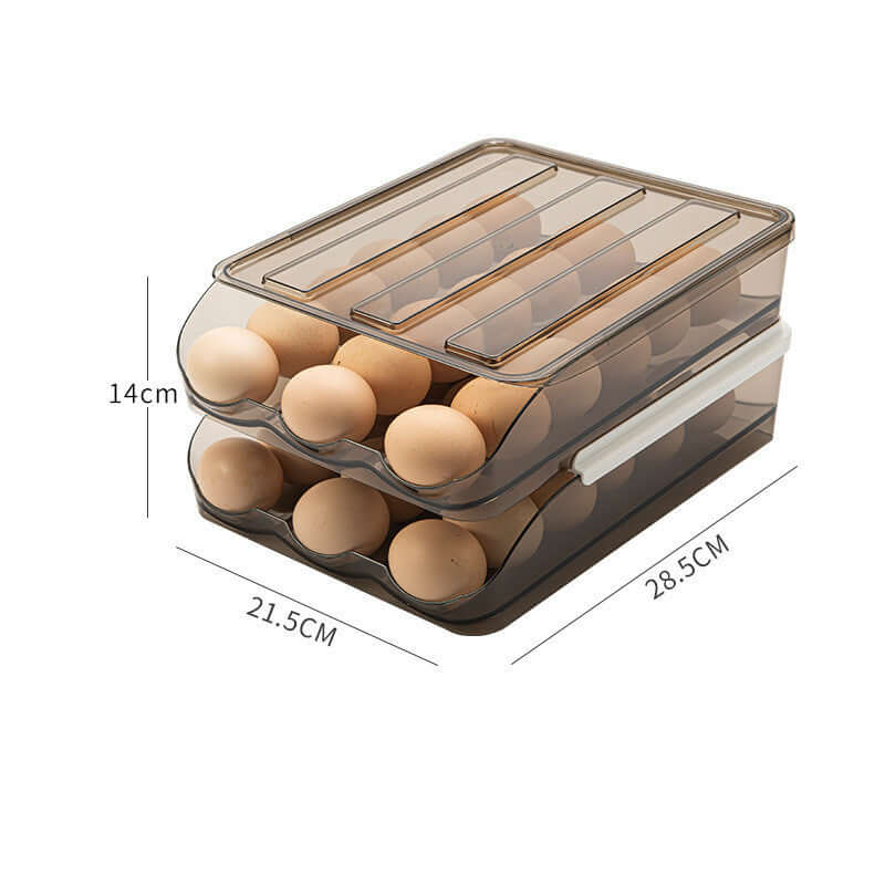 Stackable clear plastic egg storage container with brown eggs, labeled dimensions 28.5x21.5x14cm.