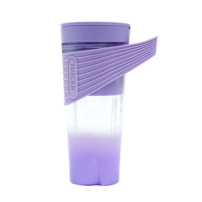 Purple portable juicer cup with silicone grip, modern kitchen accessory on white background