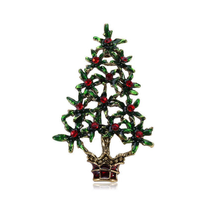 Festive Christmas tree brooch with green enamel branches and red decorative stones