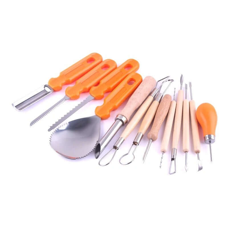 Assorted kitchen carving tools set with orange and wooden handles on a white background