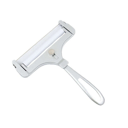 Stainless steel adjustable cheese slicer with ergonomic handle on white background