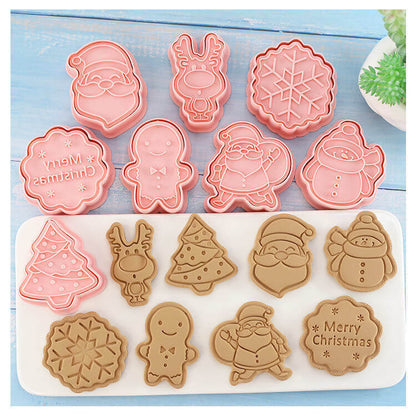 Christmas cookie cutters with festive designs and matching shaped cookies on a blue background