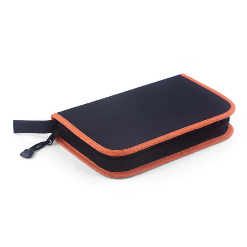 Black and orange zippered kitchen utensil storage case on white background